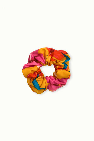 Tropical Floral Scrunchie Tropical Orange close up showing the vibrant floral print accessory.